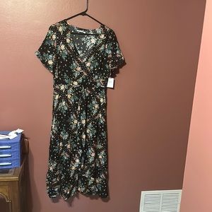 Large floral button down dress. New with tags. Never worn.